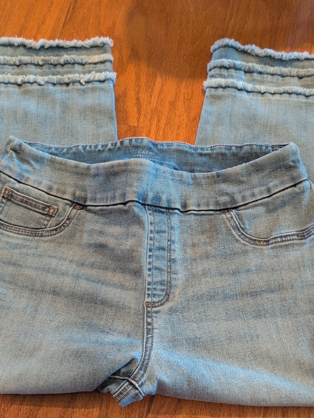Chico's Light Blue Denim Capri Jeans with Frayed Ankles